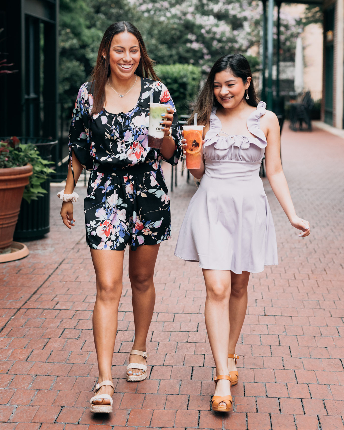 Woman holding Bubble Tea in Mason Jar